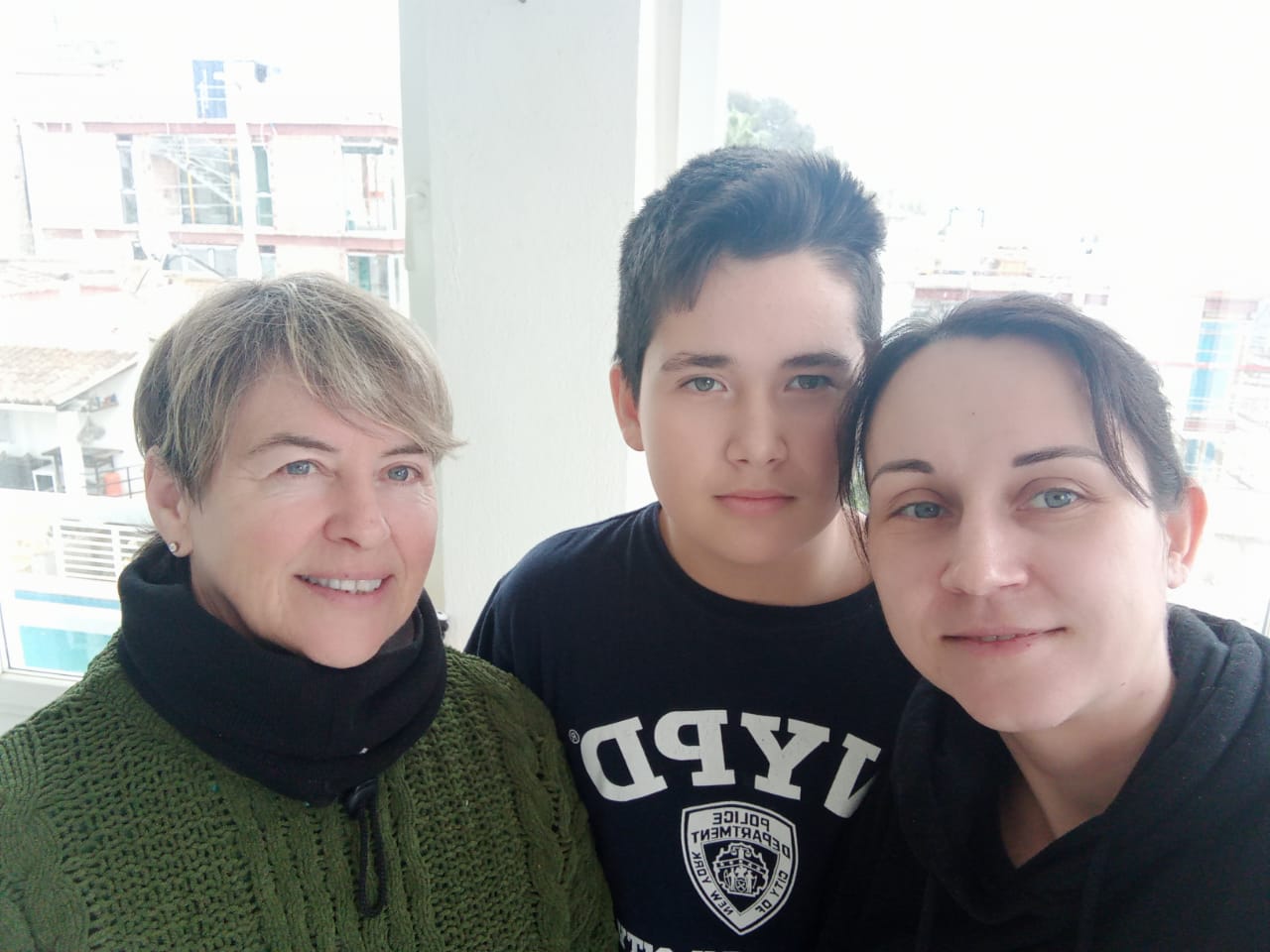 Tracey (L) with Oksana and her son